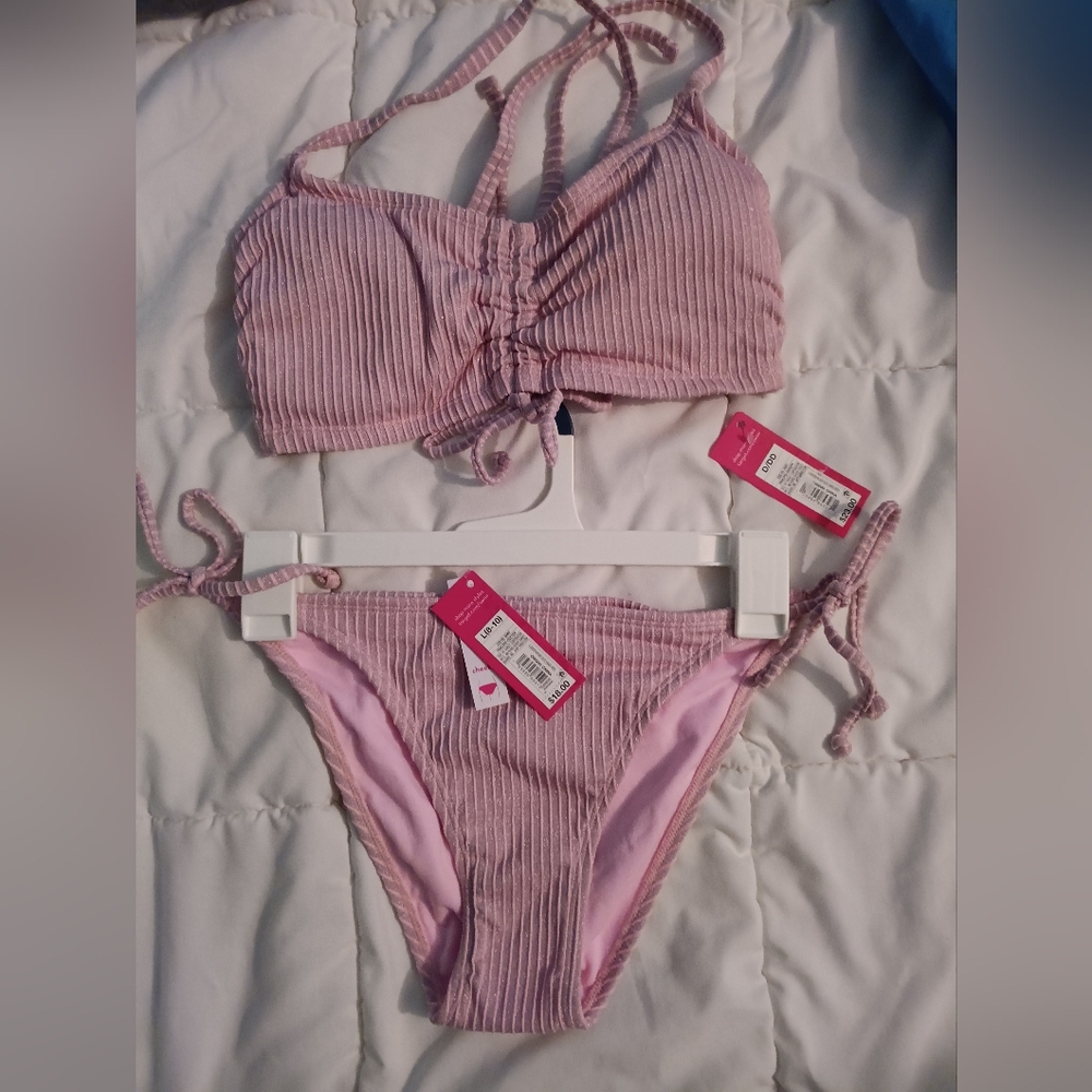 NWT BIKINI BATHING. TOP IS D/DD & BOTTOM IS LARGE. RETAIL 41.00.